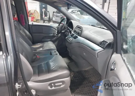 2010 Honda Odyssey Ex-L from USA, damaged, VIN 5FNRL3H69AB014040